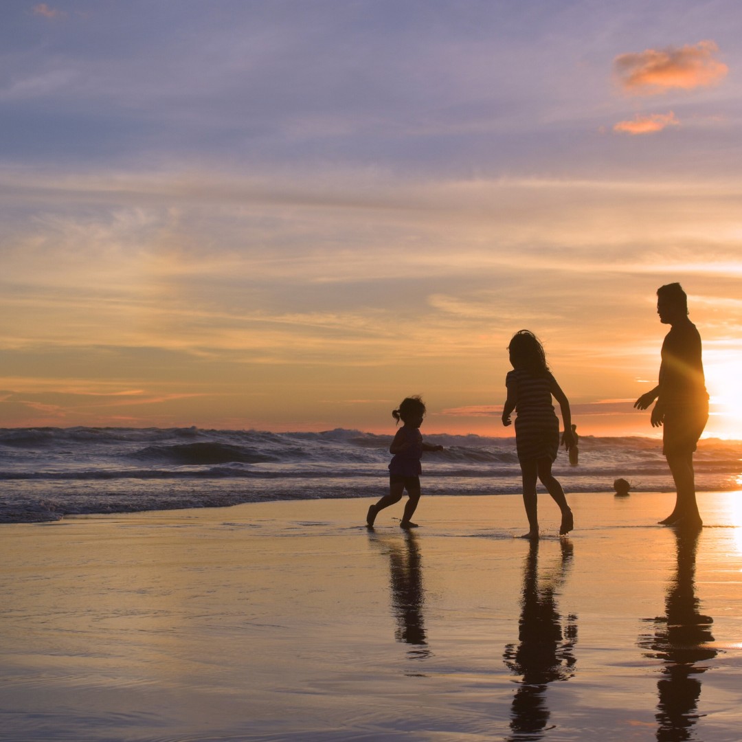 Family booking a Co Wheels car to go to the beach in England